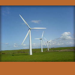 a photo of several wind turbines in function